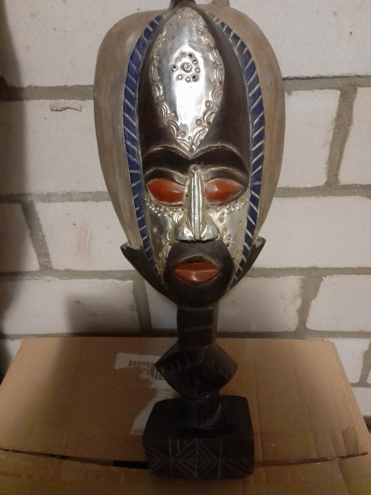Staand houten figuur uit Ghana, Ophalen