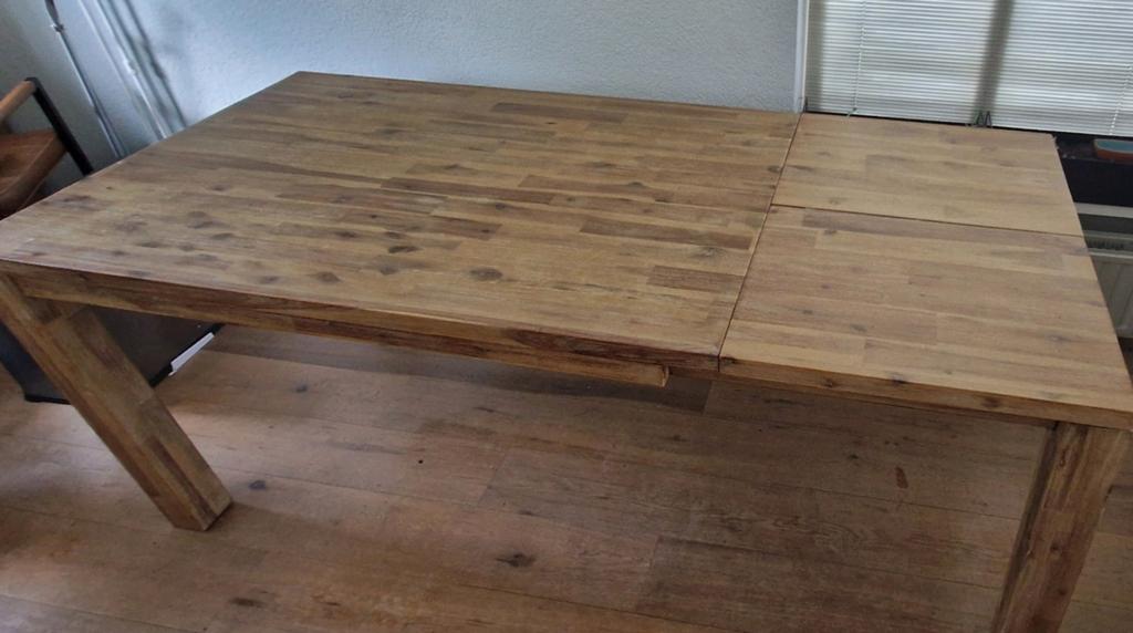 Robuuste uitschuifbare tafel van massief hout., Huis en Inrichting, Tafels | Eettafels, Ophalen, Gebruikt, Teakhout, 50 tot 100 cm