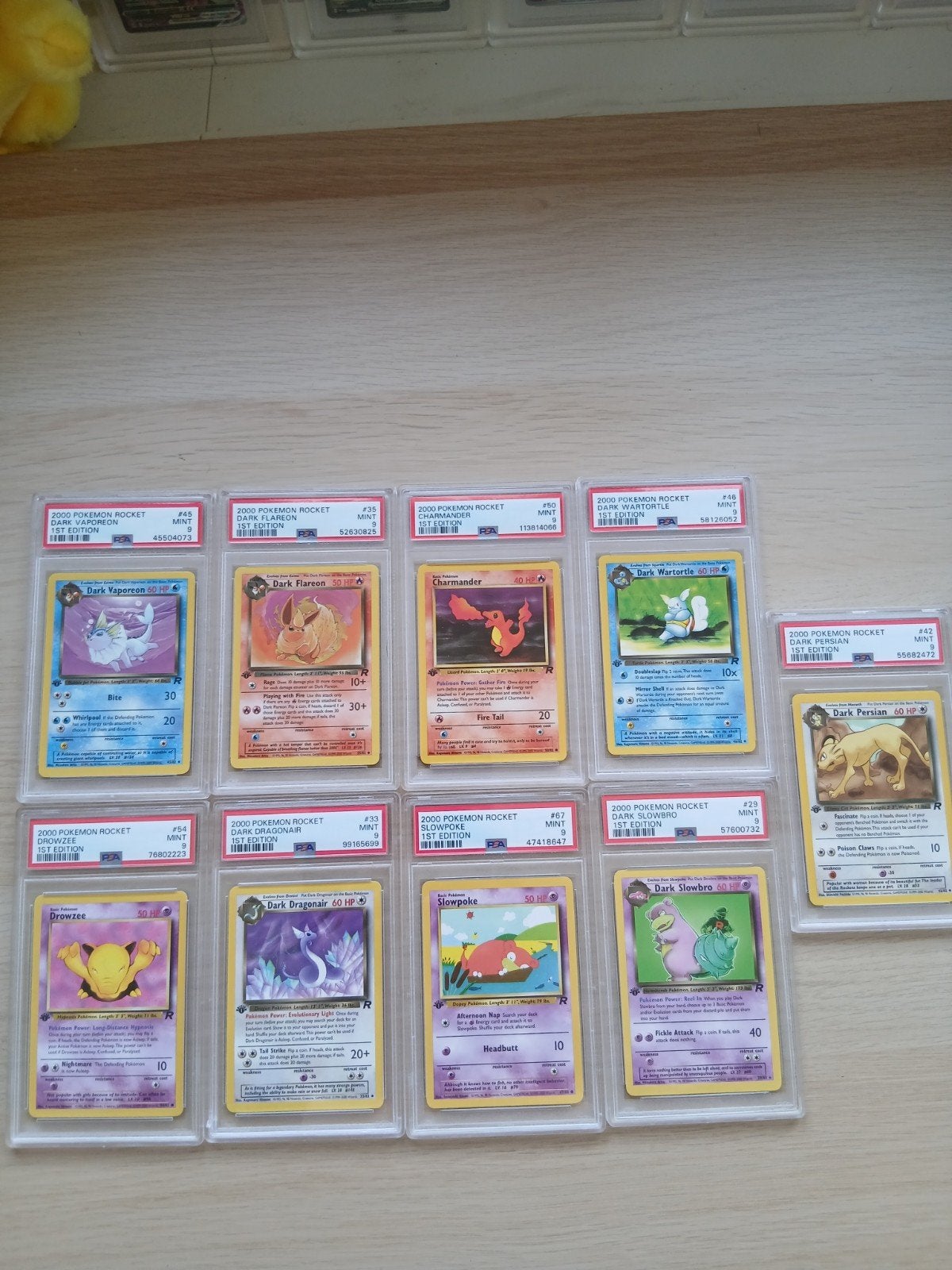 Team rocket 9 x psa 9 1st editie slab bundel, Hobby en Vrije tijd, Verzamelkaartspellen | Pokémon, Zo goed als nieuw, Ophalen of Verzenden