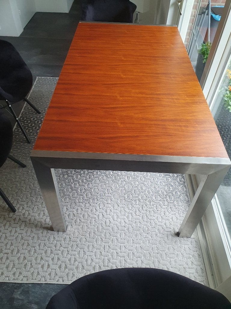rvs/hout uitschuiftafel 170 cm of 215 cm lang, Overige houtsoorten, Zo goed als nieuw, Vijf personen of meer, 150 tot 200 cm