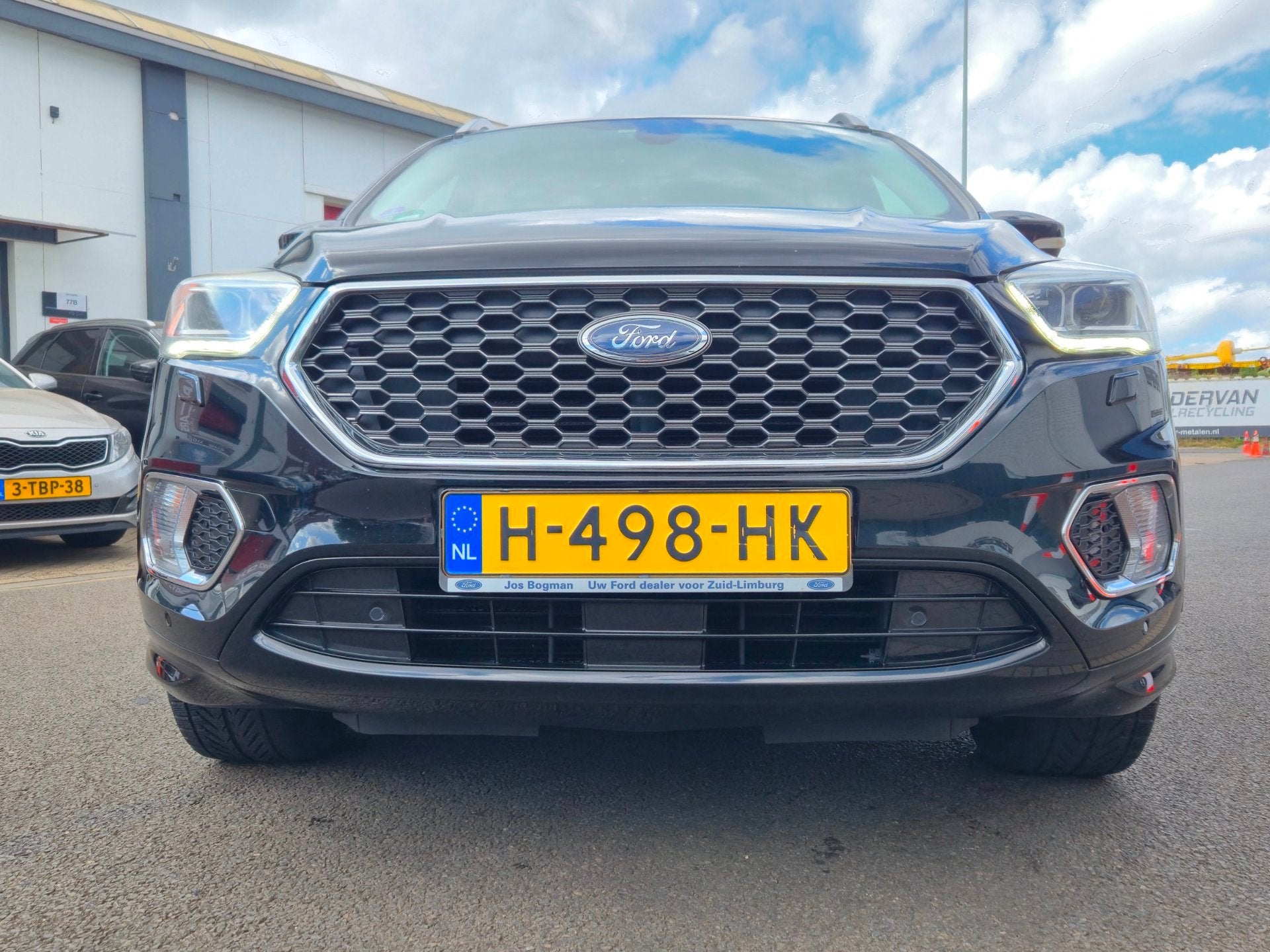 Ford Kuga 1.5 EcoBoost Vignale, Auto's, 4 cilinders, Zwart, Leder, Bedrijf