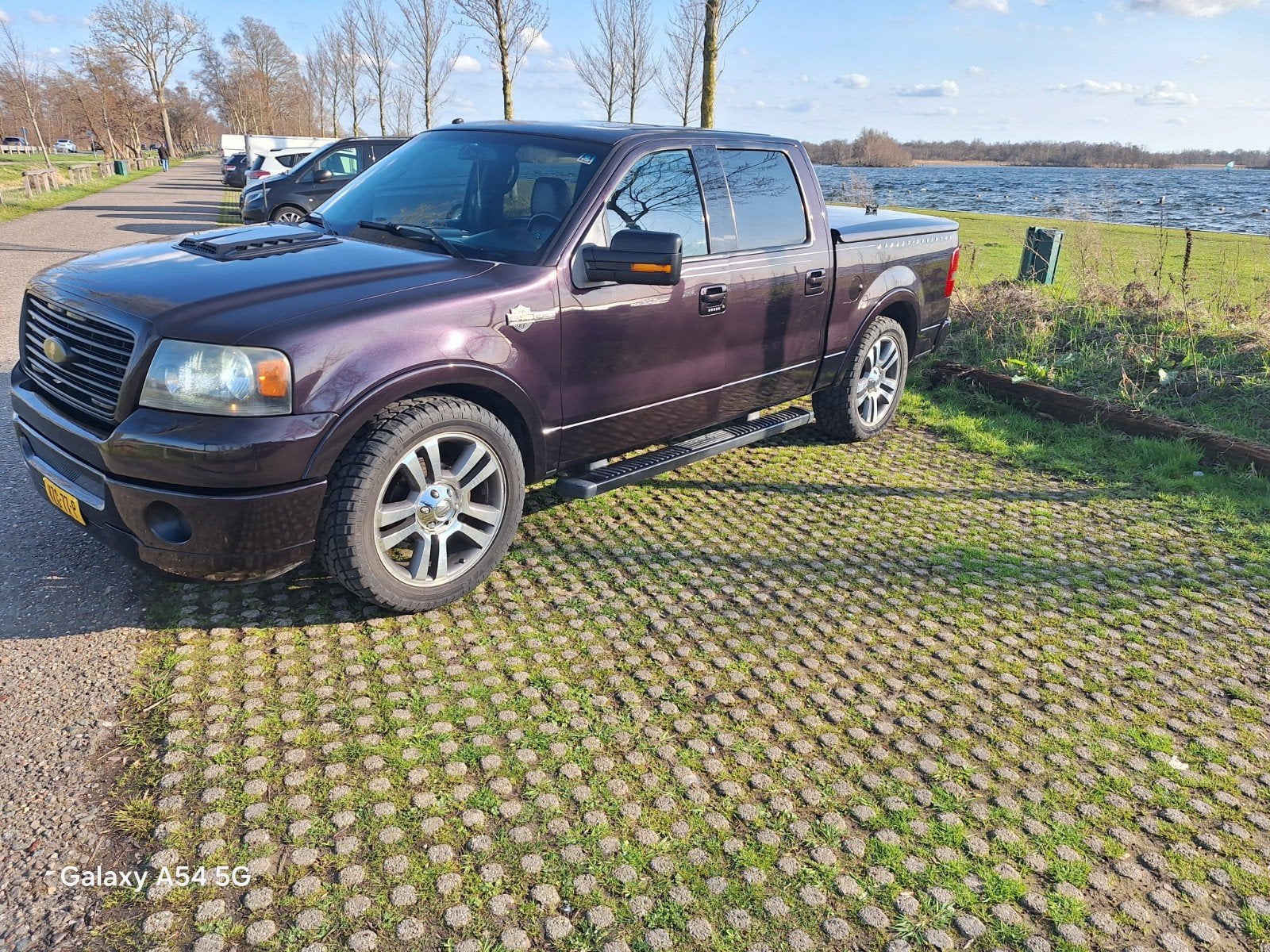 Opvallende Ford F150 Harley Davidson uit 2007, Auto's, Verwarmde buitenspiegels, Zwart, Leder, Dealer onderhouden