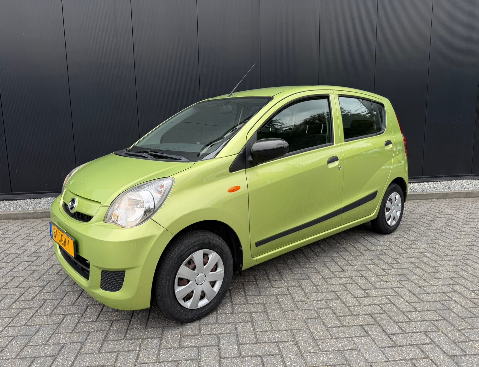 Daihatsu Cuore 1.0 5D AUT 2009 Groen, Auto's, Daihatsu, 600 kg, Zwart, 18 €/maand, 4 stoelen