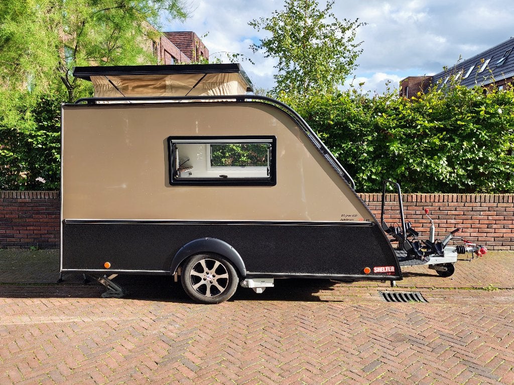 Zeer complete Kip Shelter Plus Jubileum met extra brede deur, Caravans en Kamperen, Kip, Tot en met 2, Particulier, Lengtebed