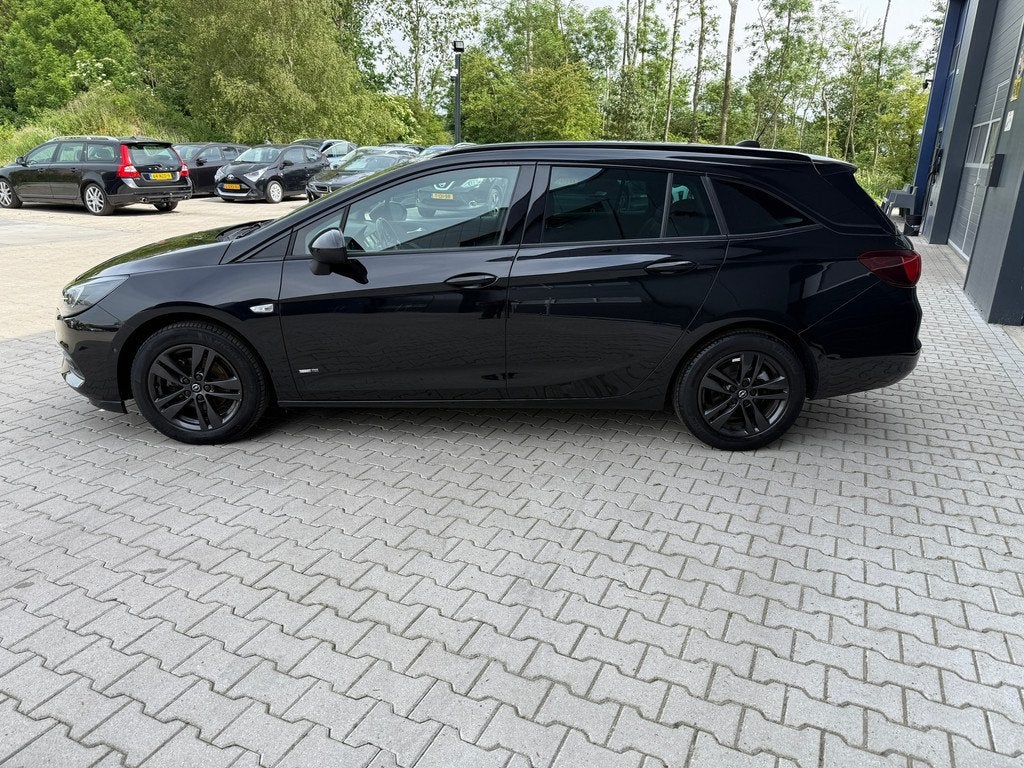 Opel Astra Sports Tourer Design & Tech camera-cruise-nieuwe, Gebruikt, 1199 cc, Leder en Stof, Zwart