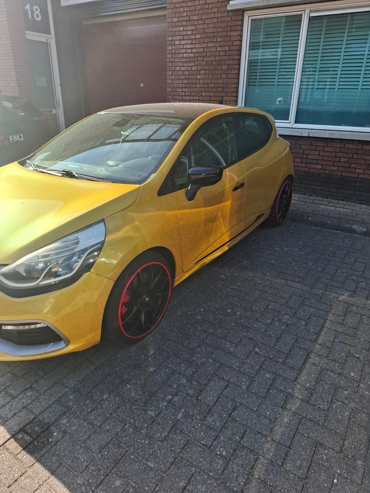 Renault Clio 1.6 RS Turbo 147KW 5-DRS AUT 2013 Geel, Auto's, 4 cilinders, Lichtsensor, Particulier, Onderhoudsboekje