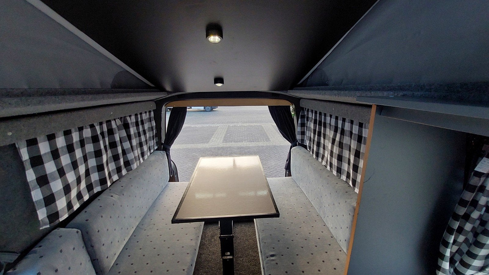 Foto 10 van VW T5 REIMO # 6 ZIT+4 SLAAPPLAATSEN # SLAAPHEFDAK #LENGTEZIT