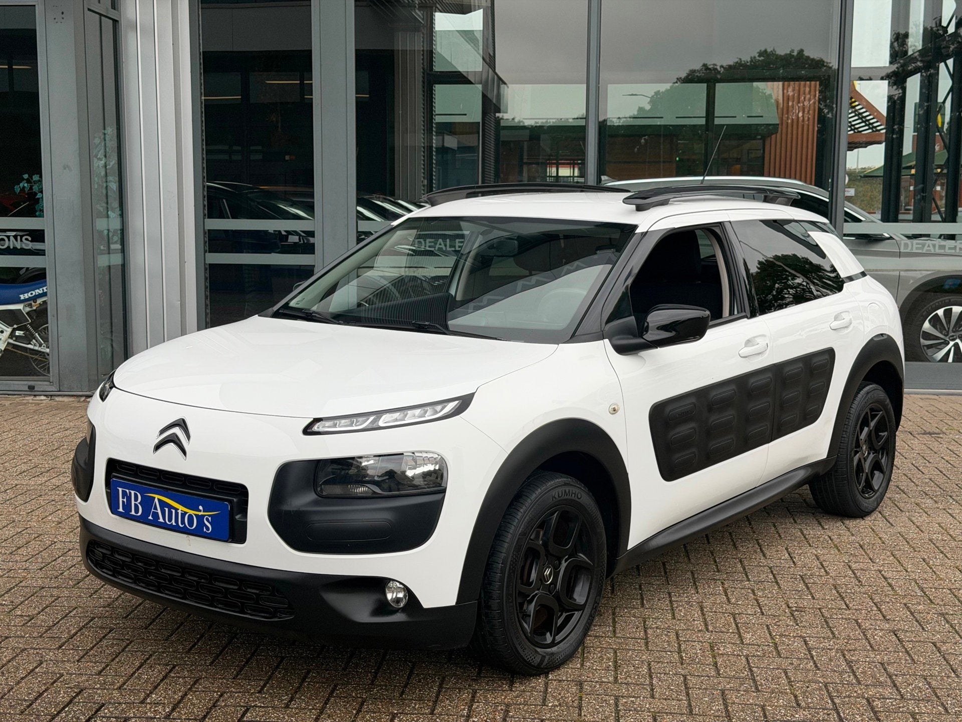 Citroen C4 Cactus 1.2 PureTech Shine Airco Lmv, Voorwielaandrijving, Stof, Gebruikt, Zwart
