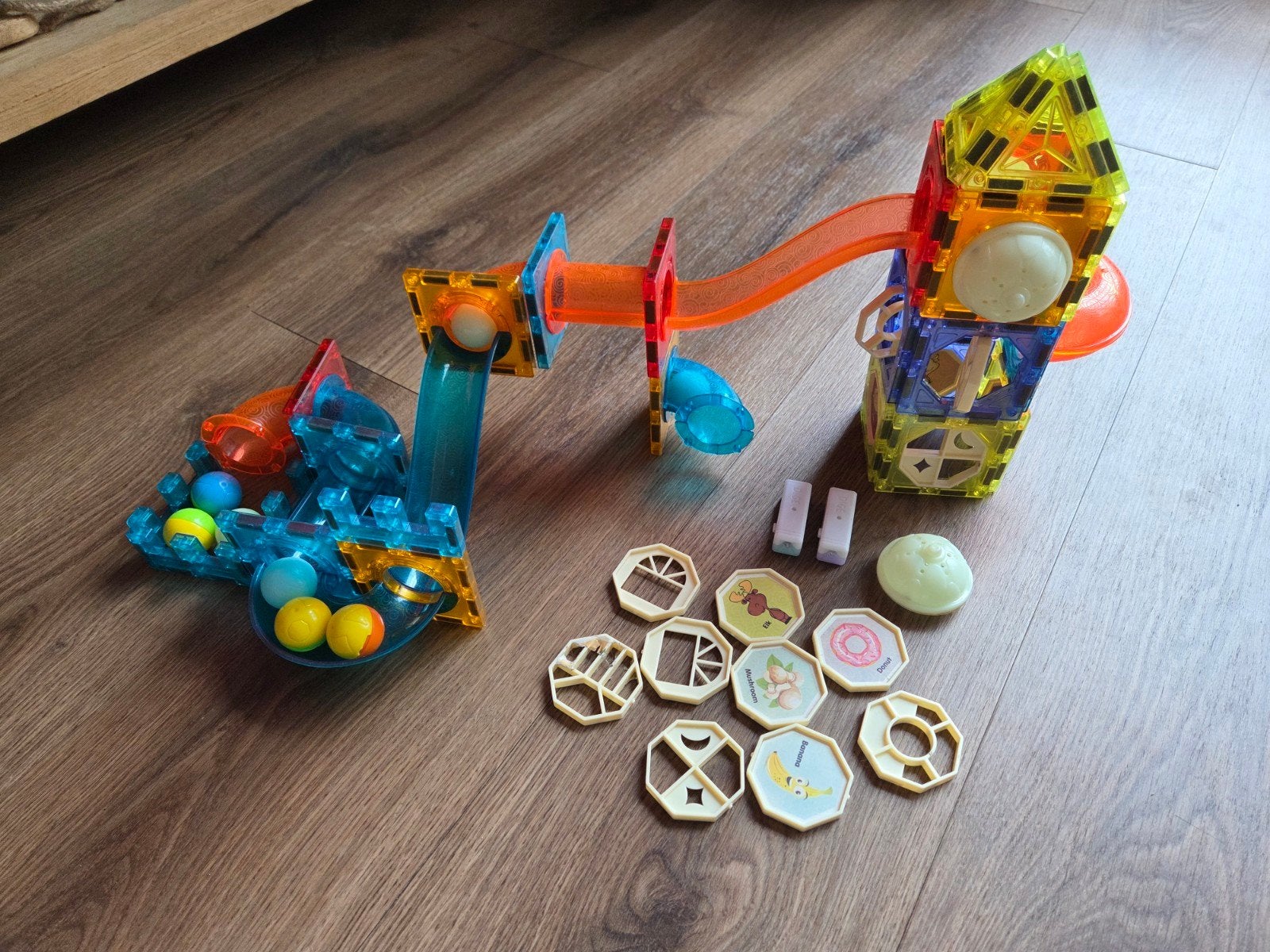 Magnetische knikkerbaan met licht en geluid, Ophalen