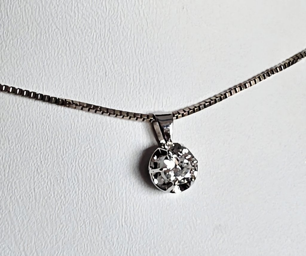 18 kt gouden hangertje met solitaire diamant 0,28kt, Ophalen of Verzenden, Zo goed als nieuw, Met edelsteen, Goud