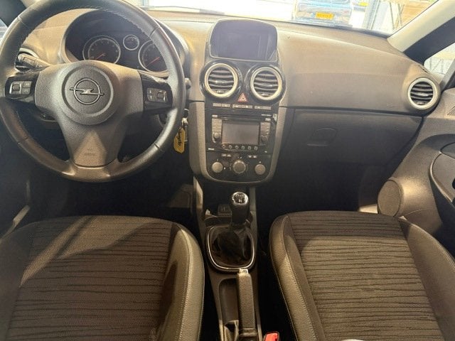Opel Corsa 1.2-16V Design Edition Navi|Cruise|Clima, Auto's, Voorwielaandrijving, Euro 5, Gebruikt, 4 cilinders