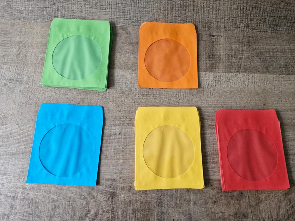 Gekleurde CD/DVD hoesjes - Diverse kleuren, Ophalen of Verzenden, Zo goed als nieuw