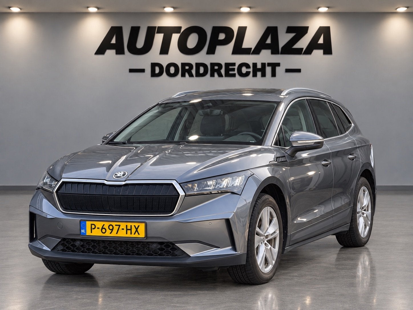Skoda Enyaq iV 80 SOH 89.4%, Auto's, Dealer onderhouden, Gebruikt, Zwart, Verwarmde buitenspiegels