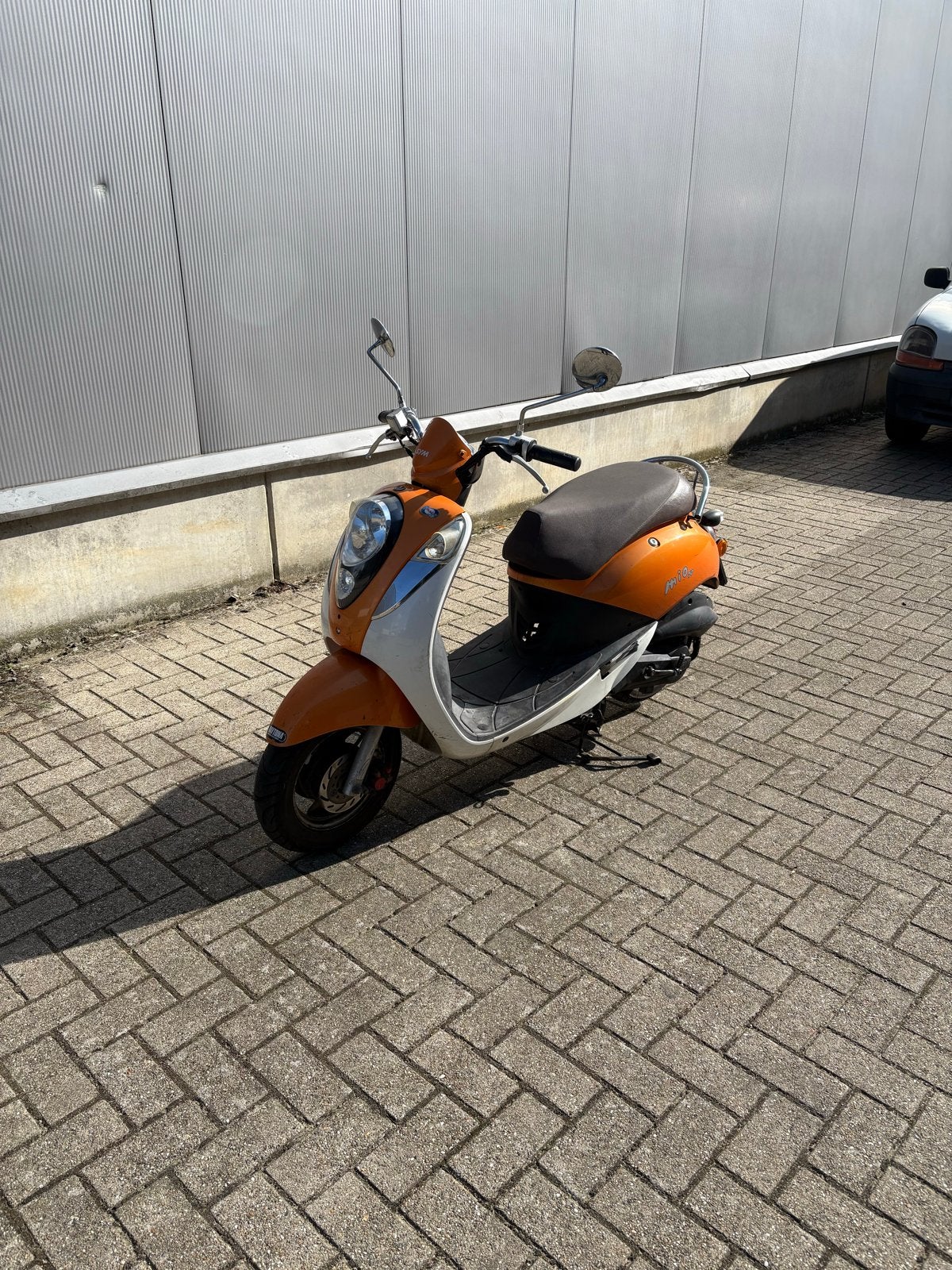 Sym Mio Scooter - Oranje/Wit -, Gebruikt, Maximaal 45 km/u, Benzine, 50 cc