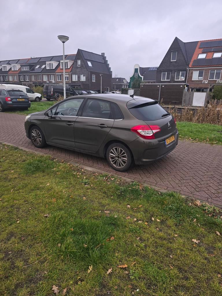 Citroën C4 1.6 VTI Berline 2010 Bruin, Auto's, Citroën, Voorwielaandrijving, Stof, 1550 kg, Zwart