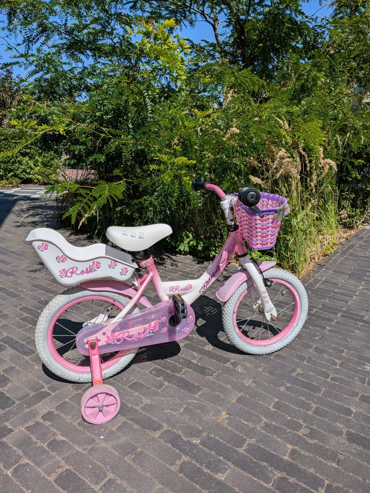 Roze kinderfiets 14inch, Ophalen, Terugtraprem, Zijwieltjes, Gebruikt
