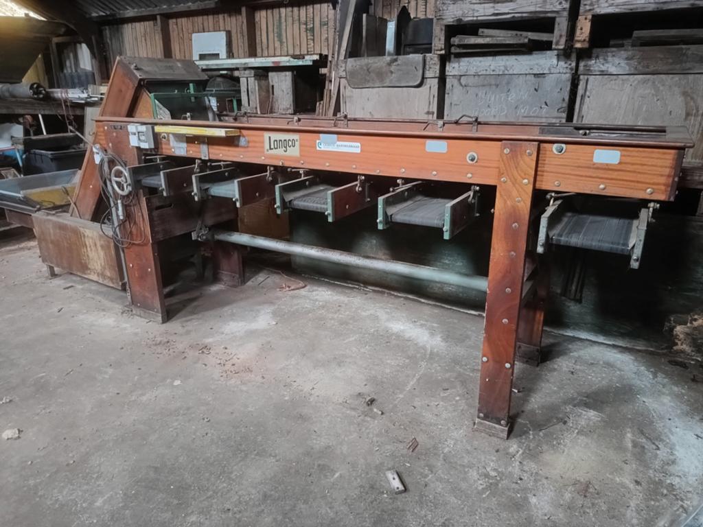 Sorteermachine lango, Ophalen