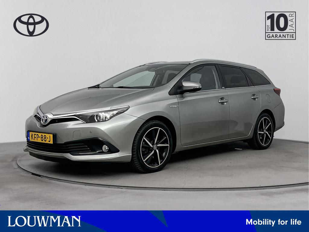 Toyota Auris Touring Sports 1.8 Hybrid Executive Go | PDC vo, Auto's, Toyota, 12 maanden, Gebruikt, Alcantara, Hybride Elektrisch/Benzine