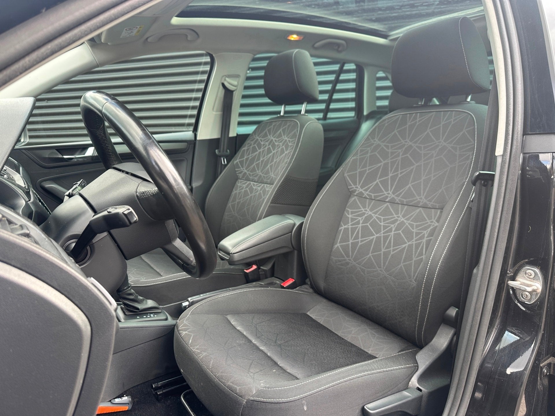 Skoda Rapid Spaceback 1.0 TSI 95pk DSG | Navi | Pano | Clima, Auto's, Stof, Gebruikt, 95 pk, Zwart