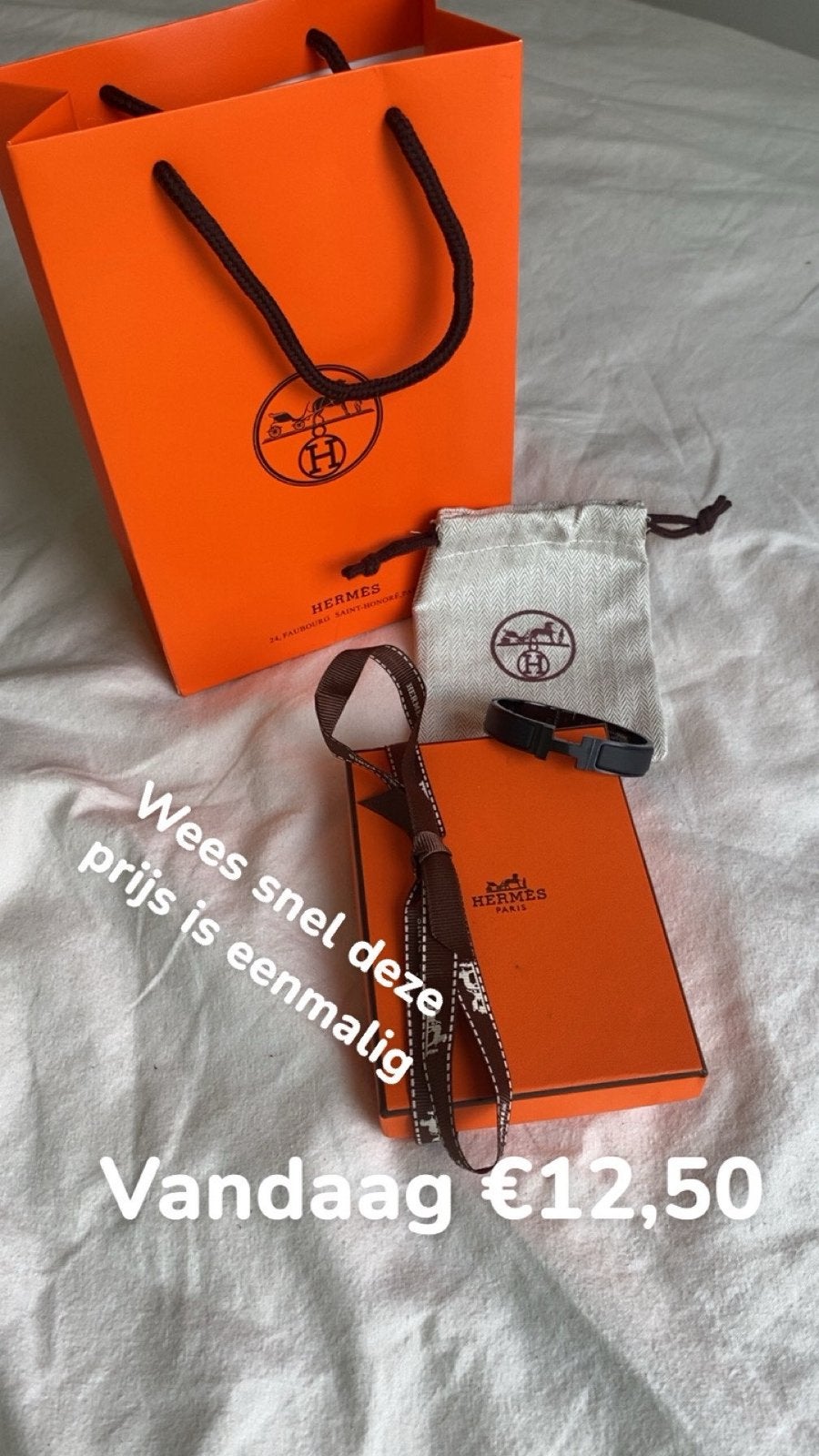 Hermès Armband met Verpakking en Tasje, Sieraden, Tassen en Uiterlijk, Armbanden, Ophalen of Verzenden, Nieuw, Zwart, Overige materialen