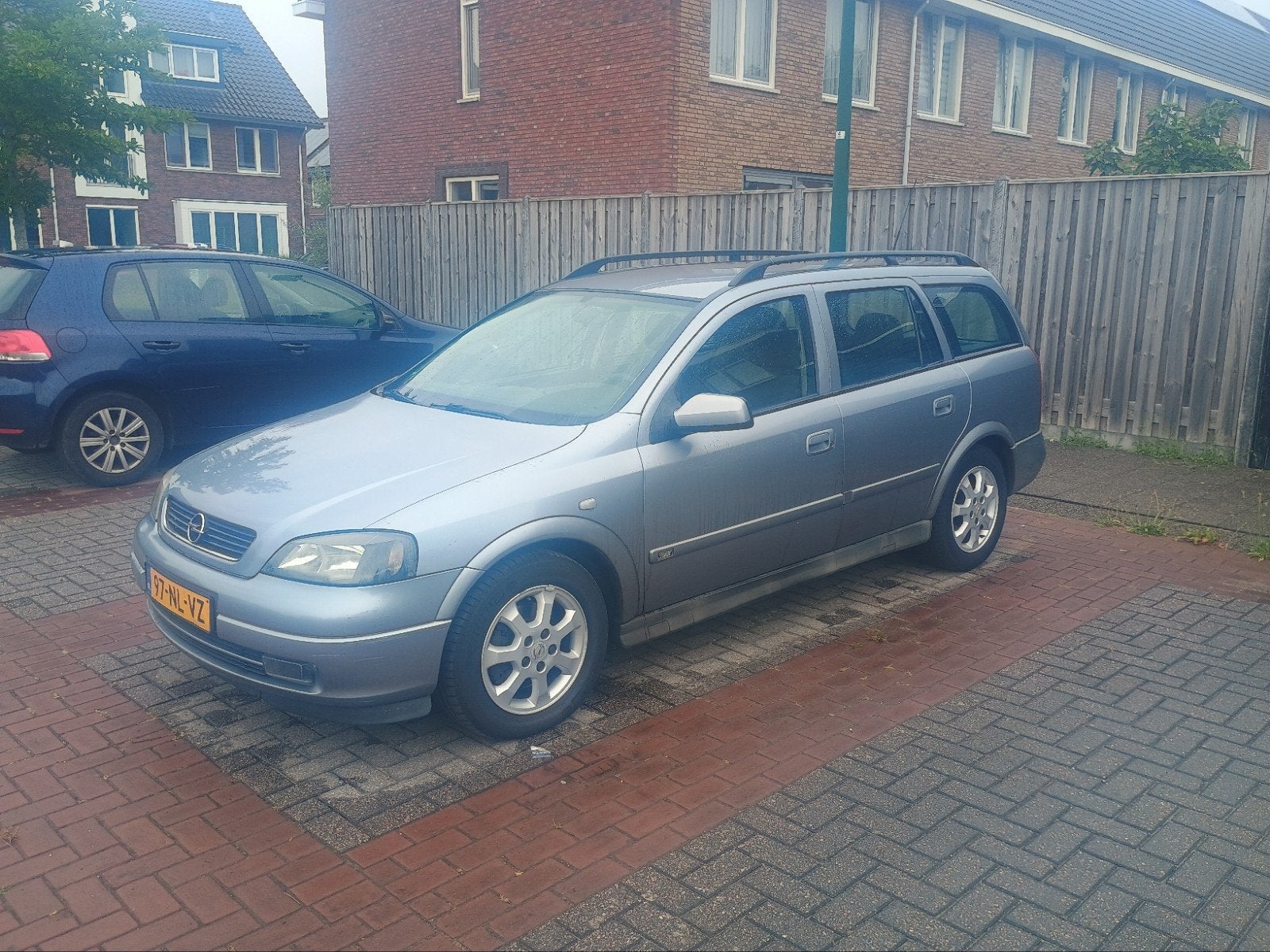 Opel Astra 1.8 16V St.wgn. 2003 Grijs, Auto's, 125 pk, 4 cilinders, 1796 cc, Origineel Nederlands