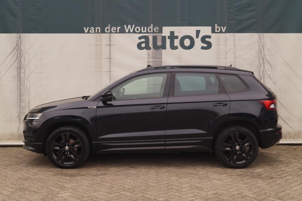 Skoda Karoq 1.5 TSI 150pk Sportline Business -PANO-ECC-LED-N, Voorwielaandrijving, Stof, Euro 6, 4 cilinders