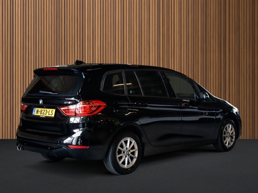 BMW 2 Serie Gran Tourer 216i 7p. Business Edition Plus 1e-Ei, Auto's, Keurmerk '100% Onderhouden', 12 maanden, Gebruikt, 7 stoelen