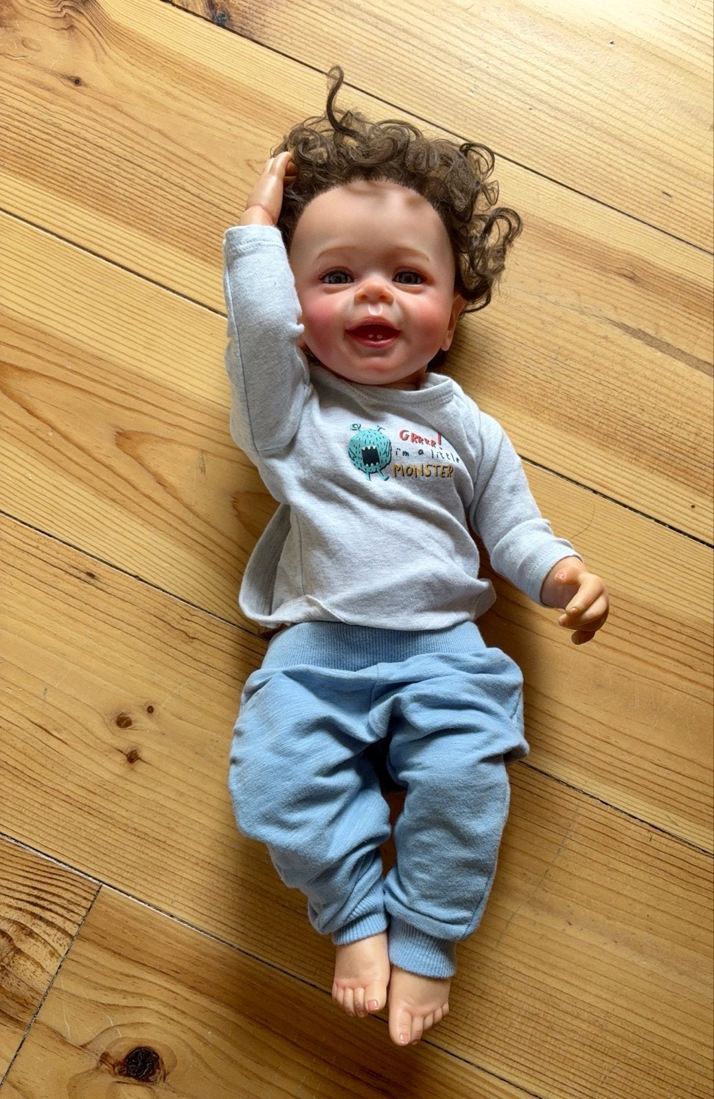 Reborn babypop met krullen en kleding, Ophalen of Verzenden, Zo goed als nieuw, Babypop