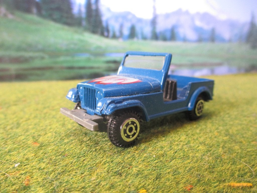 1:64 Jeep CJ-7 - Yatming blauw, Ophalen of Verzenden, Zo goed als nieuw, Auto