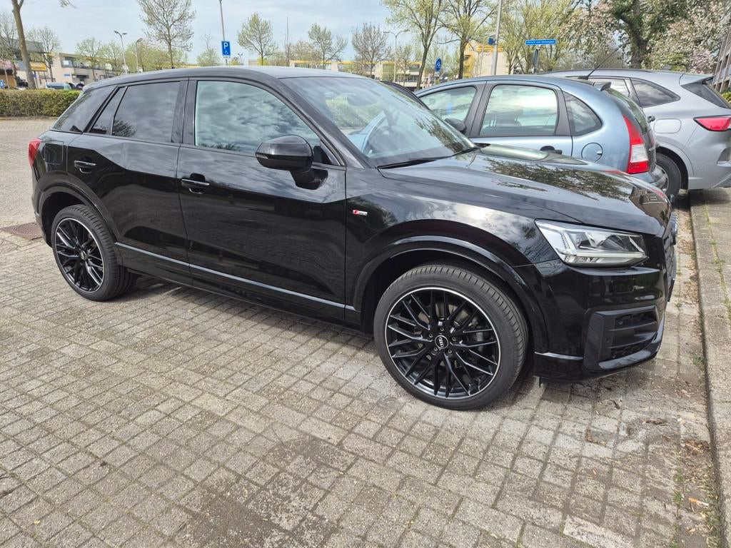 Mooie Audi Q2 te koop!, Auto's, Automaat, Stof, Q2, Zwart