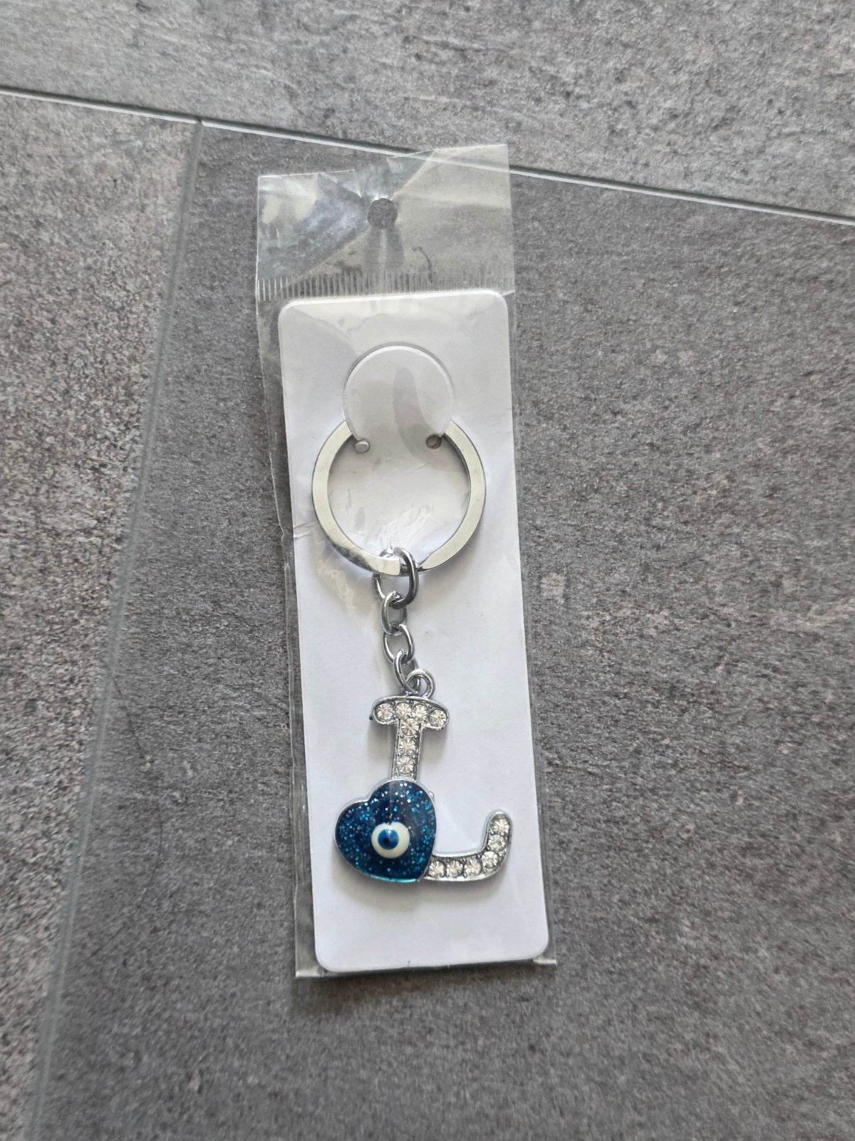 Sleutelhanger letter L boze kwade bescherm oog NIEUW, Ophalen of Verzenden, Nieuw