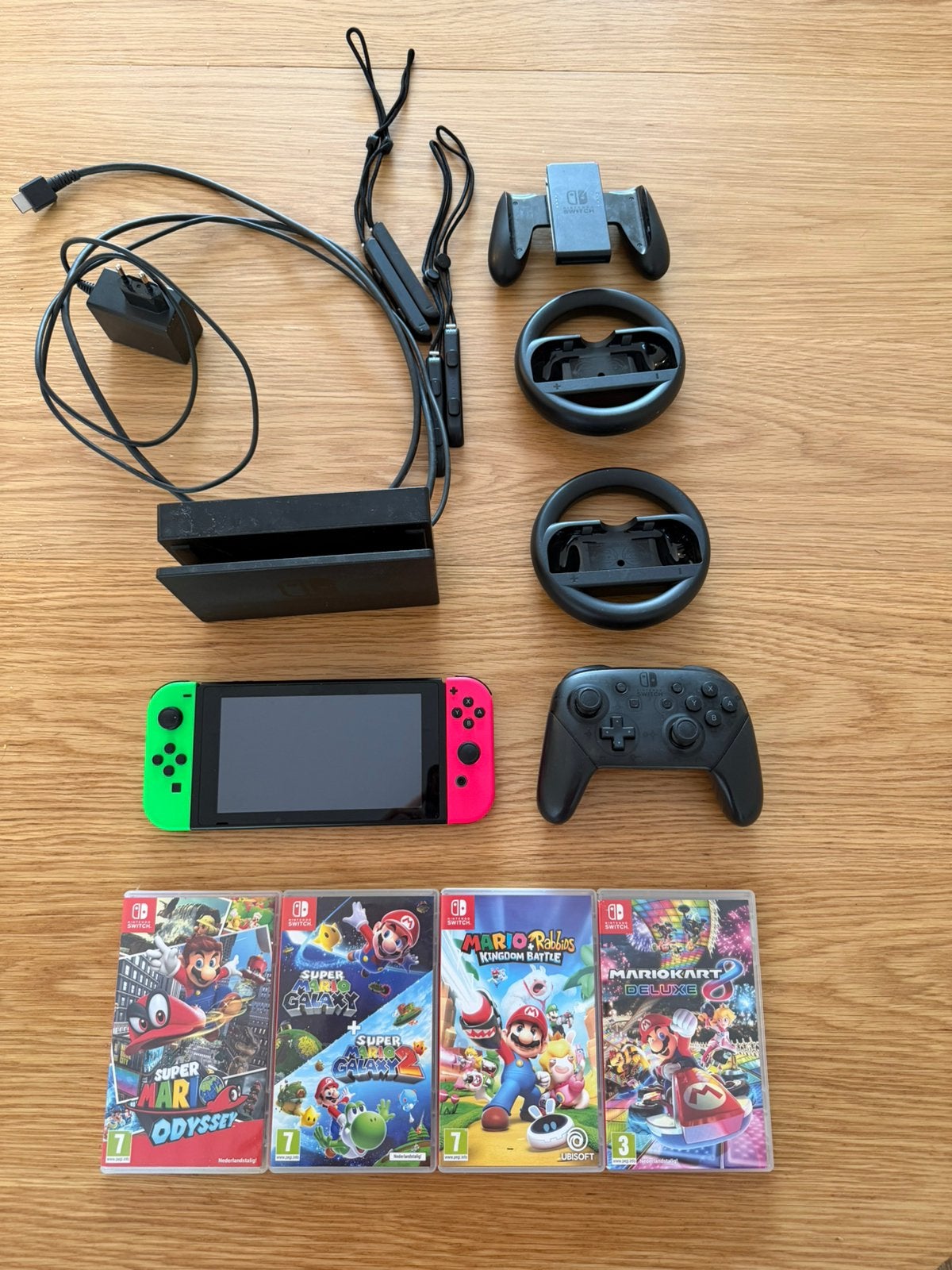 Nintendo Switch met 4 spellen en extra controllers, Spelcomputers en Games, Spelcomputers | Nintendo Switch, Ophalen of Verzenden