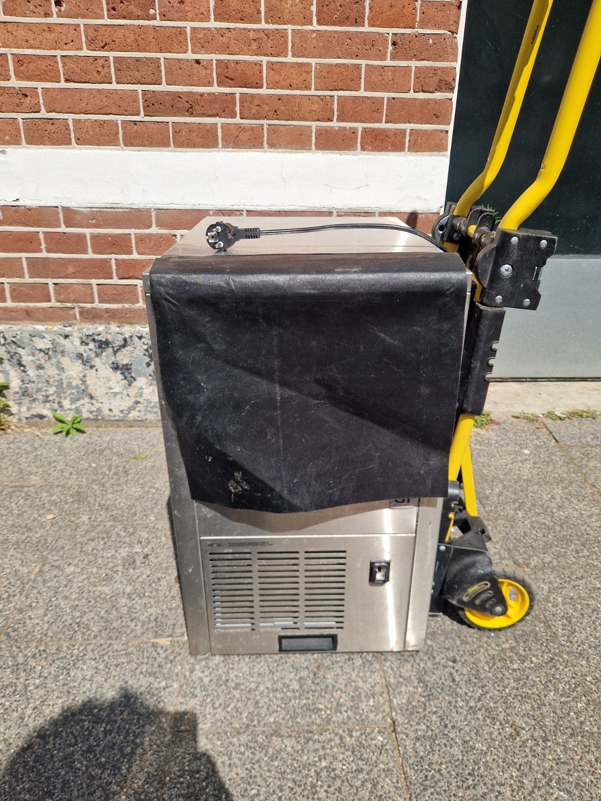 ijsblokjes machine, Ophalen