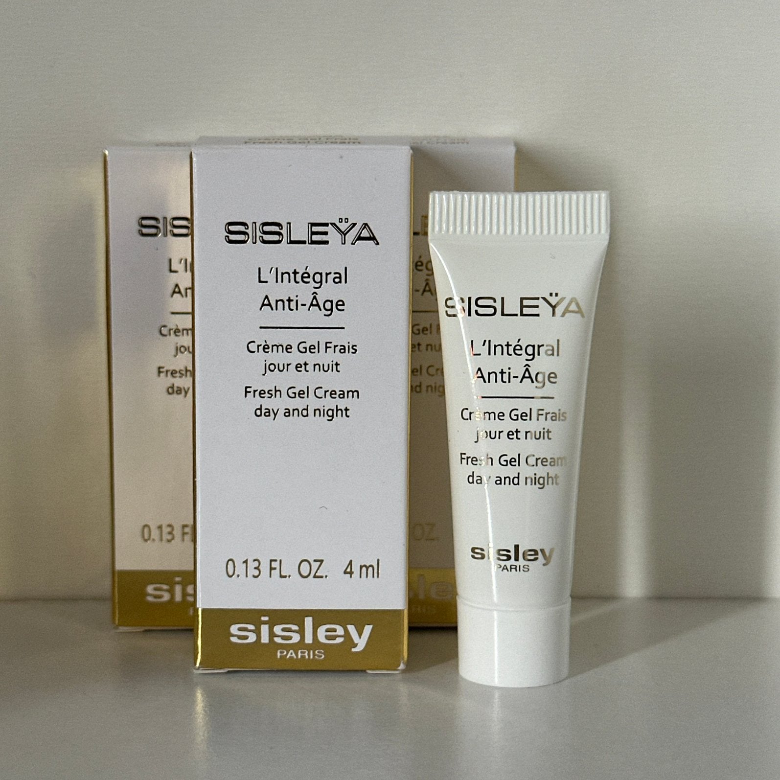 Sisley Sisleya L’integral Anti-Age Fresh Gel Cream 4 ml, Ophalen of Verzenden, Nieuw, Gehele gezicht, Verzorging
