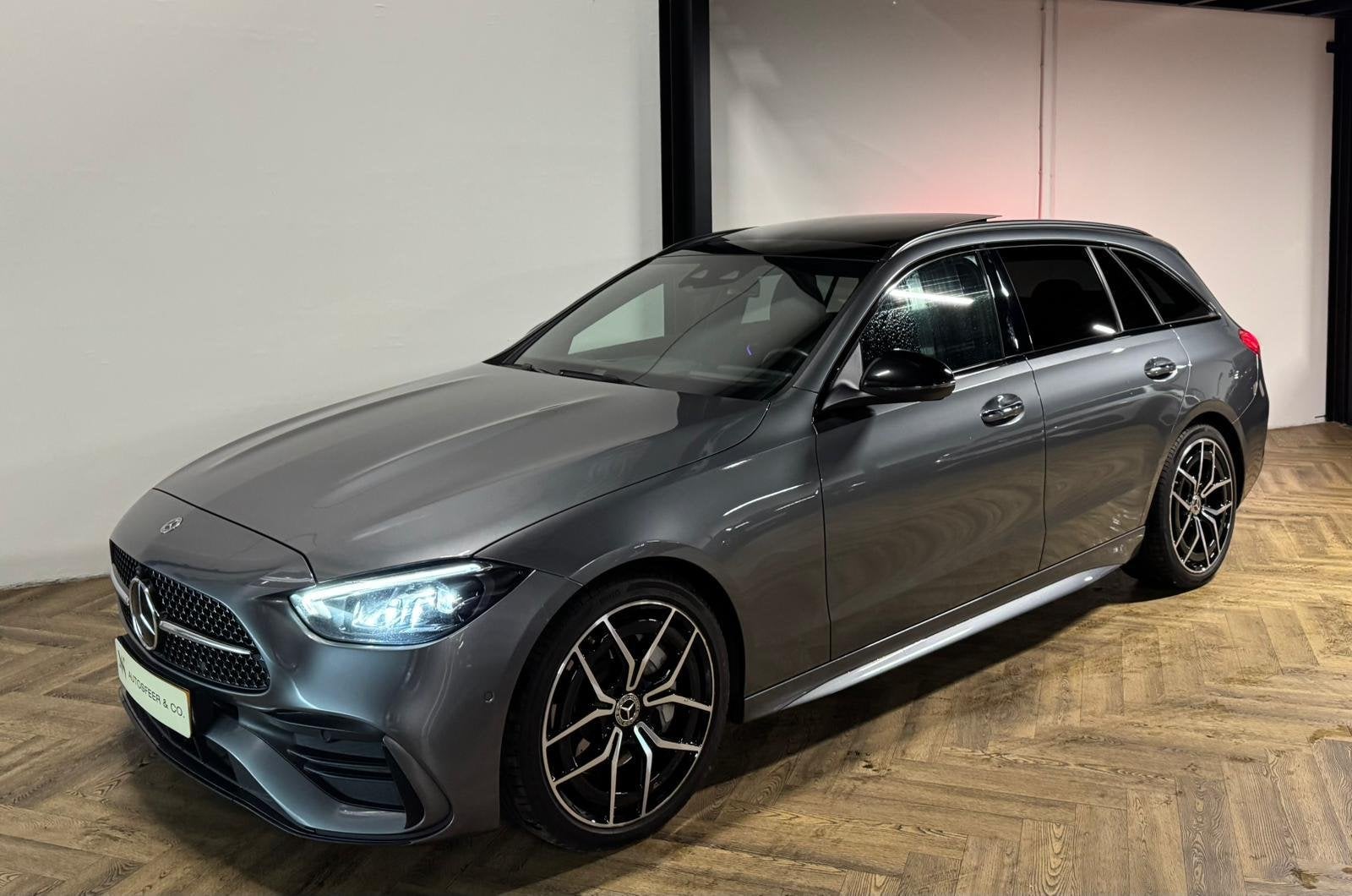 Mercedes-Benz C-klasse 220 d 4MATIC AMG Mild Hybride PANO KE, Auto's, Gebruikt, Zwart, 4 cilinders, Bedrijf