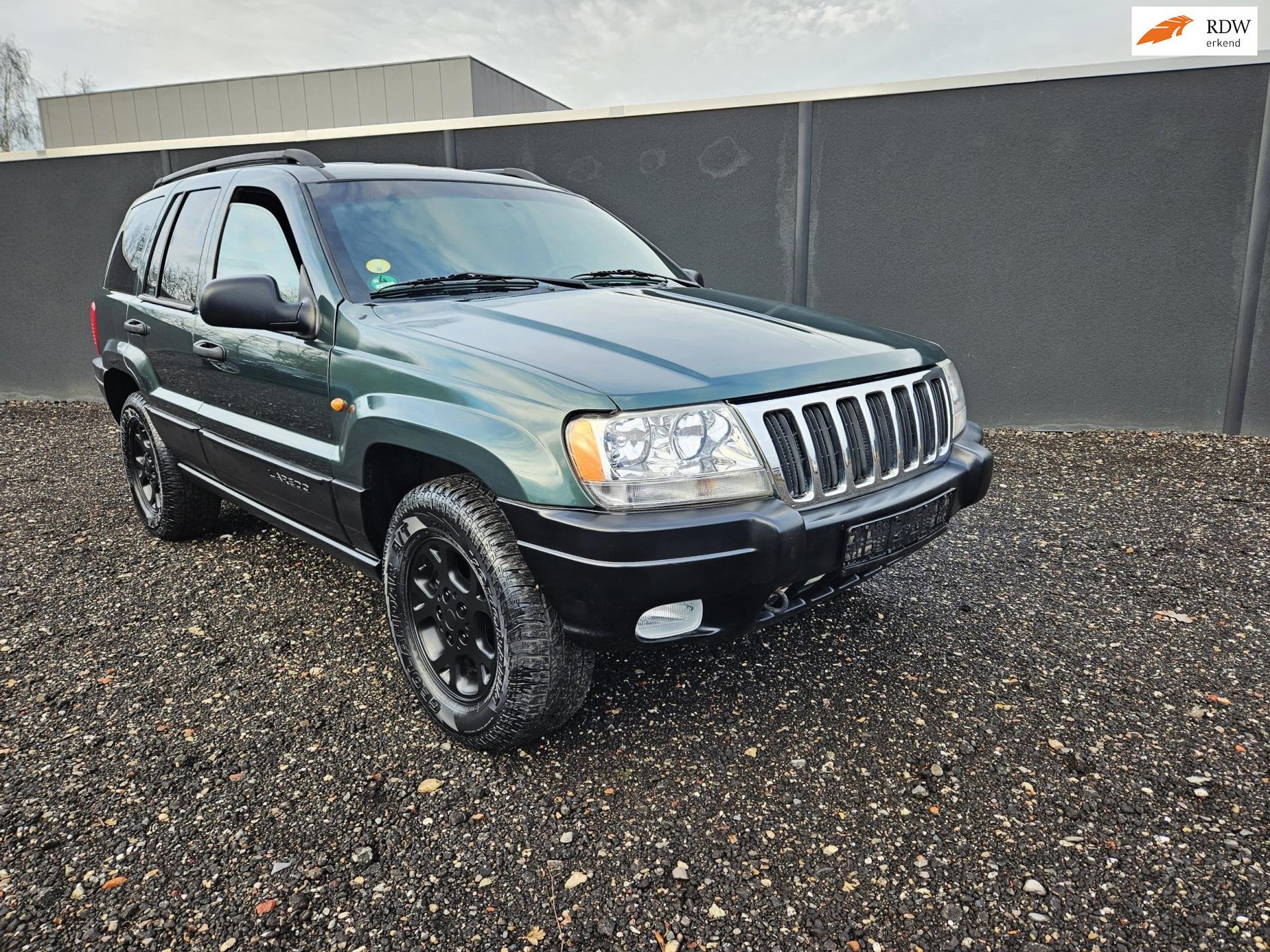 Jeep Grand Cherokee 4.0i LAREDO AUTOM. € 2950 NETTO EXPORT, Auto's, Automaat, Gebruikt, Zwart, 190 pk