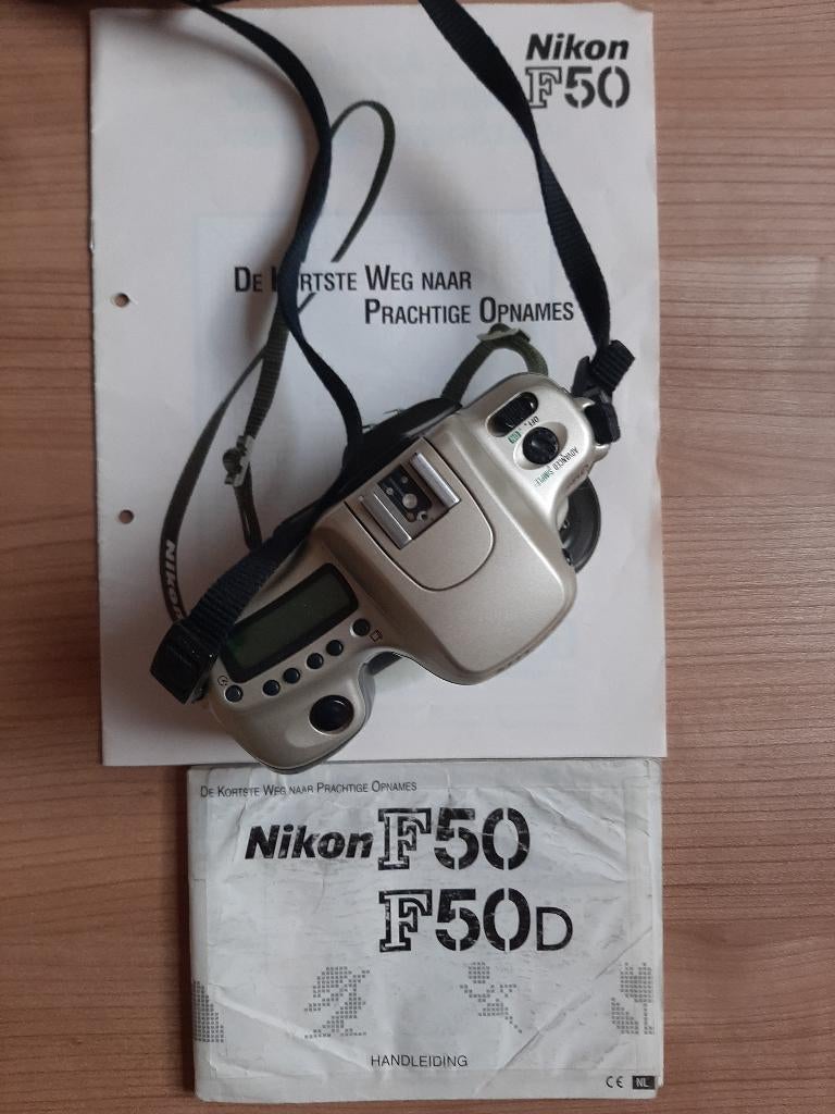 Nikon F50, lenzen, Luxon flitser en nog veel meer!, Ophalen of Verzenden, Gebruikt