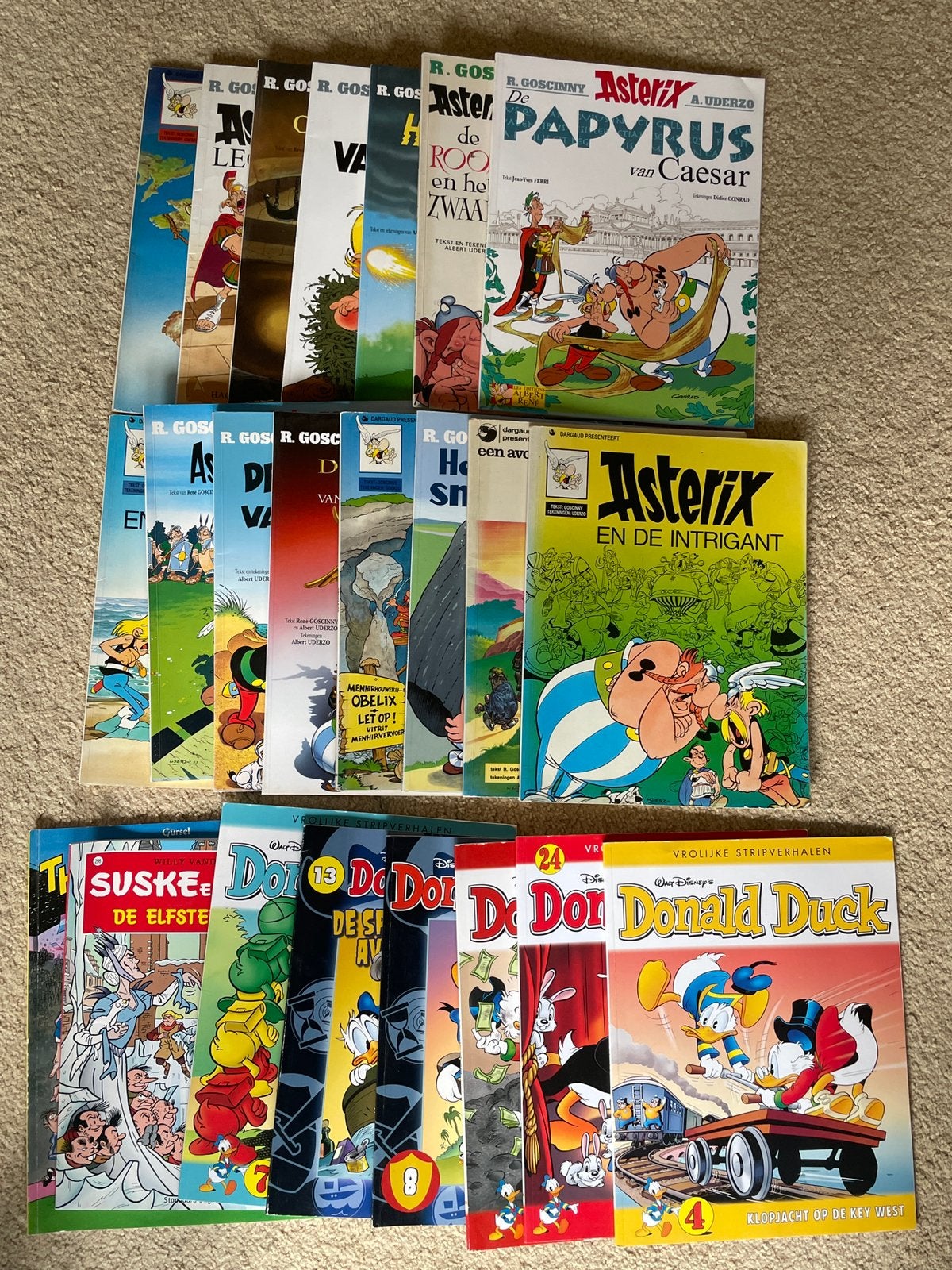Asterix en Obelix en Donald Duck strips, Meerdere stripboeken, Ophalen of Verzenden, Zo goed als nieuw