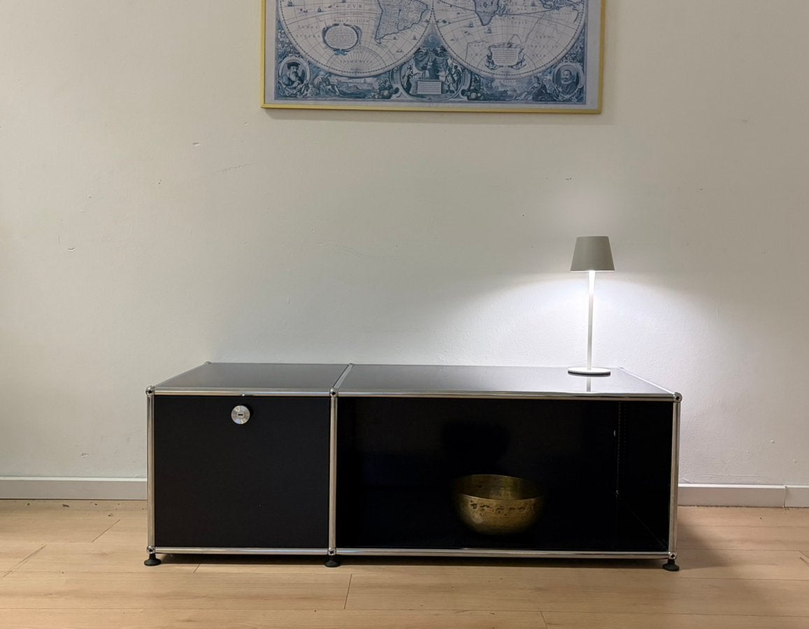USM Haller Lowboard in black with a folding door, Huis en Inrichting, Ophalen, Gebruikt, 25 tot 50 cm, Minder dan 100 cm