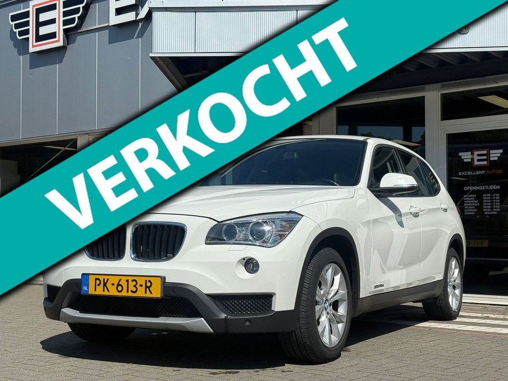BMW X1 SDrive18d Business Automaat | Leder | Navi, Auto's, BMW, Euro 5, Achterwielaandrijving, Zwart, Wit