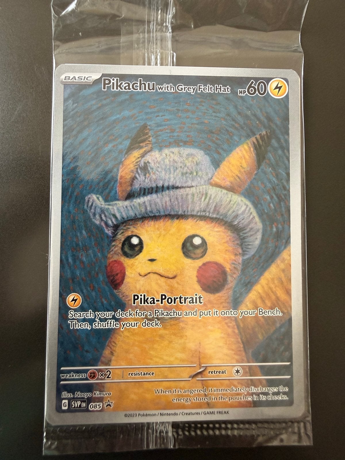 Pikachu met Grijze Vilthoed Pokémon Kaart (SVP EN 085), Ophalen of Verzenden, Nieuw, Losse kaart