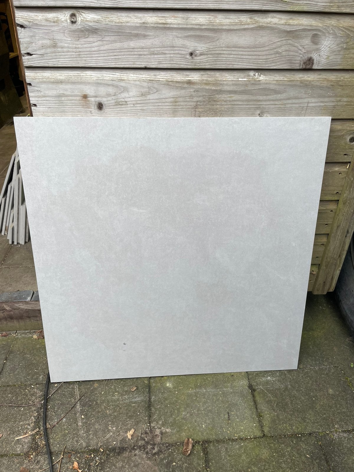 Grijze betonlook tegels plavuizen 70x70 26stuks plus rest st, Ophalen, Zo goed als nieuw