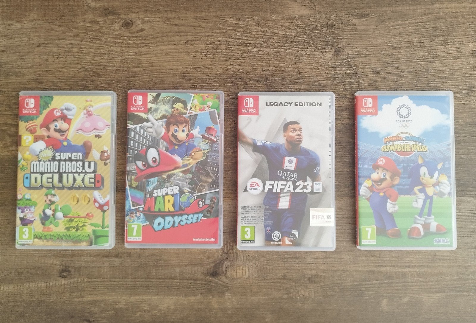 Super Mario Bros Deluxe, Odyssey, Olympic games & FIFA 2023, Online, Ophalen of Verzenden, Zo goed als nieuw, 3 spelers of meer