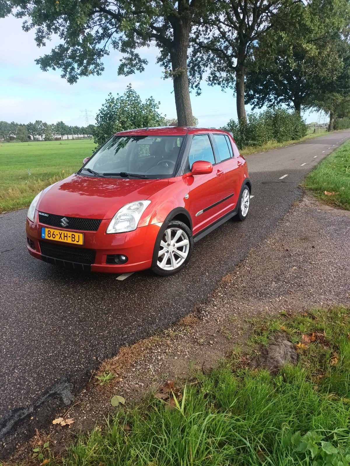 Suzuki Swift 1.3 exclusive gt line 5D 2007, Voorwielaandrijving, Stof, 40 €/maand, Zwart