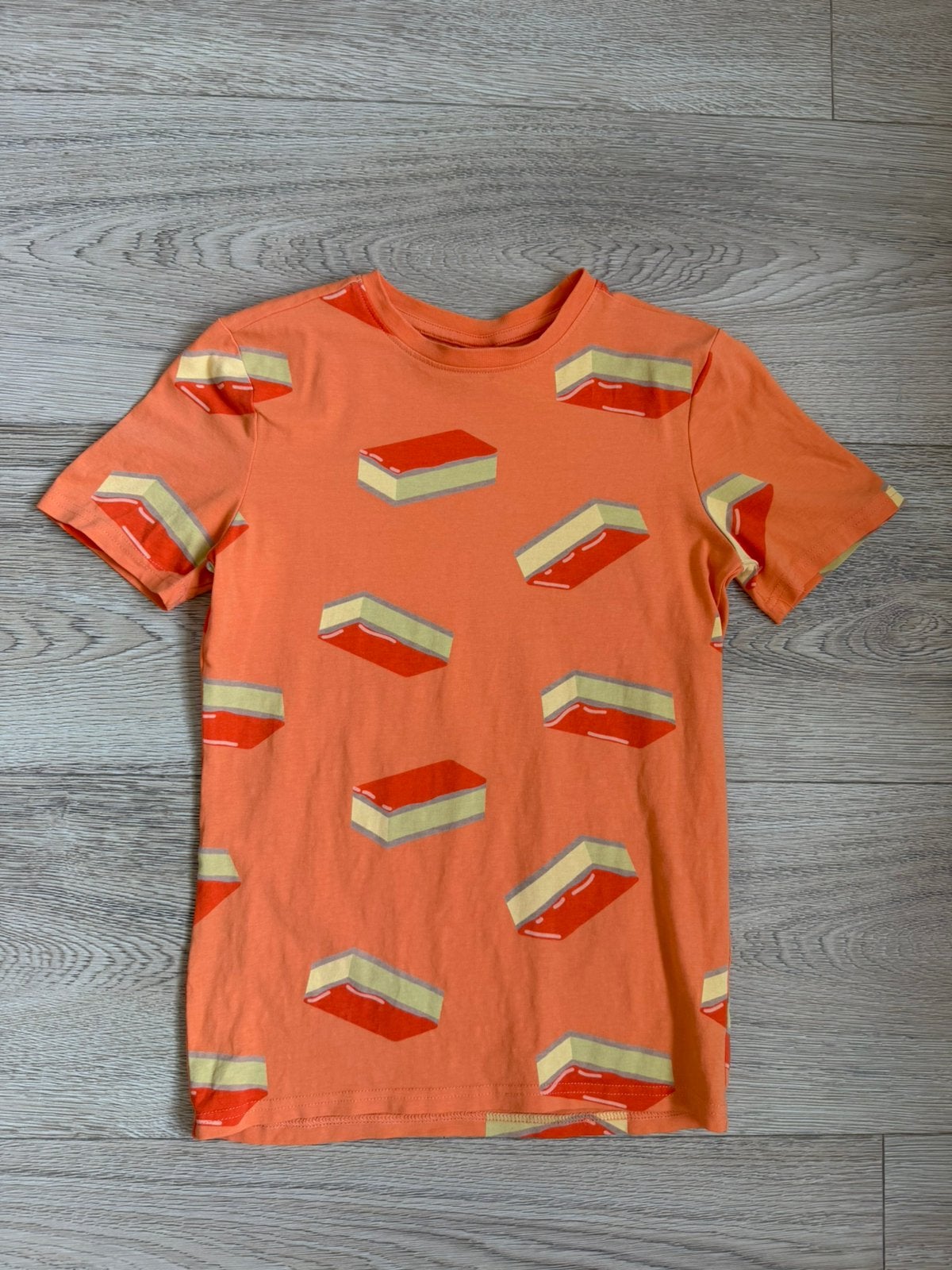 Hema oranje t-shirt Tompouce Maat 146/152, Ophalen of Verzenden, Zo goed als nieuw, Jongen of Meisje, Shirt of Longsleeve