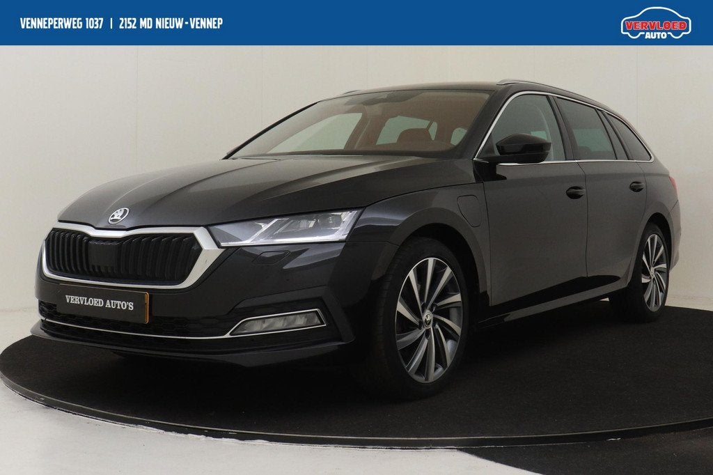 Skoda Octavia Combi 1.4TSI/204PK IV PHEV BUSINESS EDITION PL, Auto's, Skoda, Gebruikt, Zwart, Plug-in hybride, 13 kWh