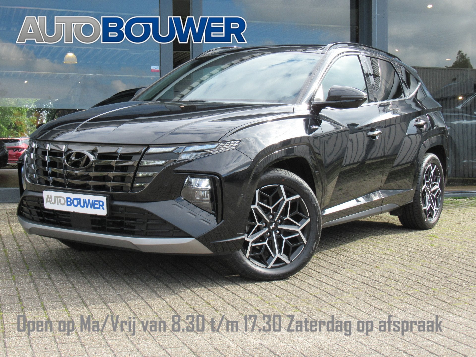 Hyundai Tucson 1.6 T-GDI PHEV 265 PK N Line Sky 4WD 1e eigen, Auto's, Automaat, Gebruikt, Zwart, 4 cilinders