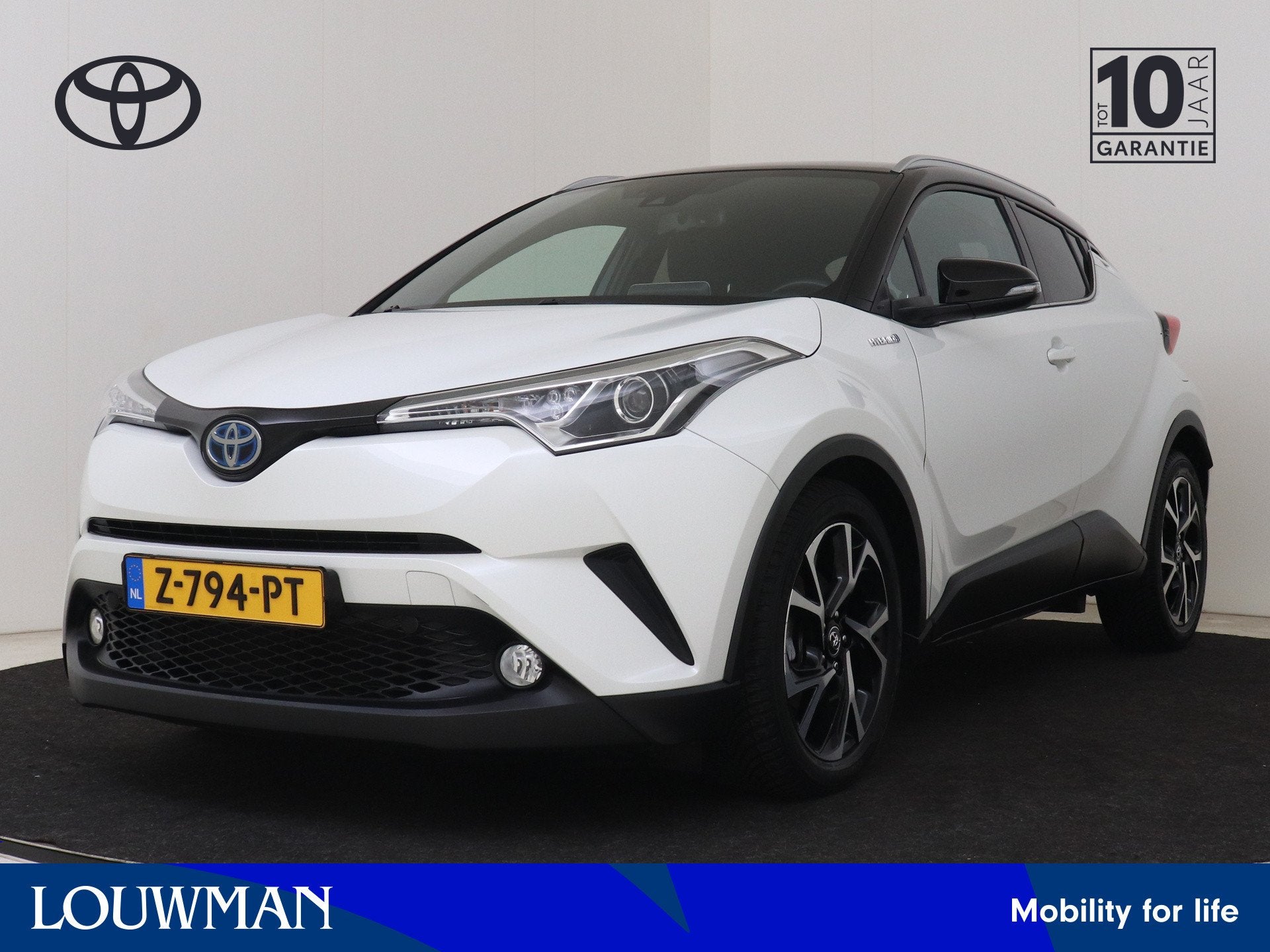 Toyota C-HR 1.8 Hybrid Style Bi-Tone | Navigatie | Stoelverw, 12 maanden, Stof, 4 cilinders, 26 km/l
