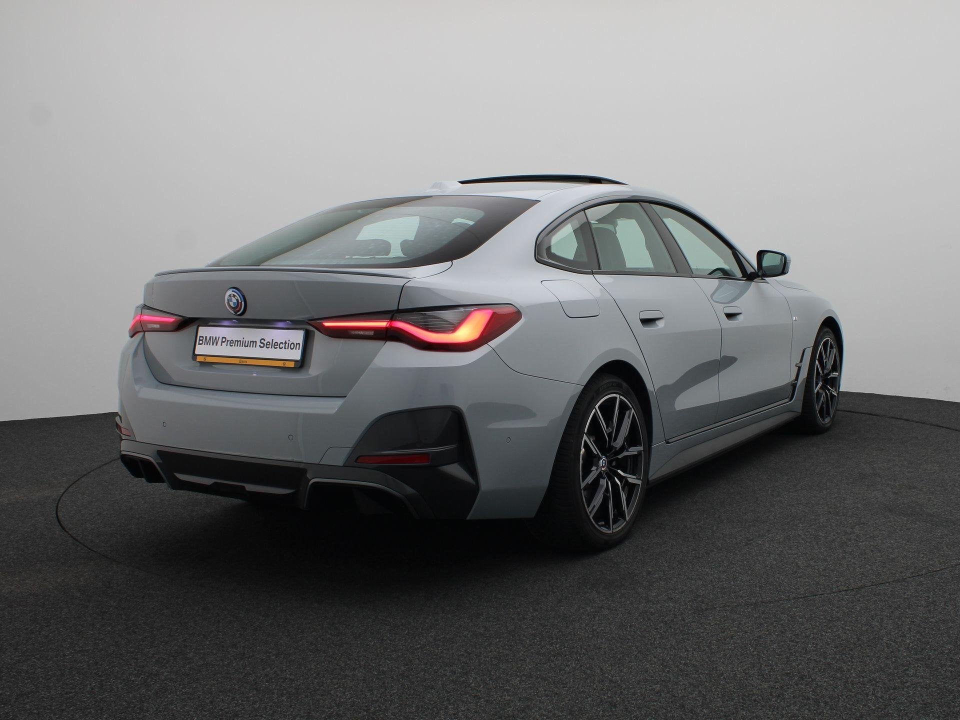 BMW i4 eDrive40 High Executive | M Sportpakket | Schuifdak |, 590 km, Met garantie (alle), 340 pk, Origineel Nederlands