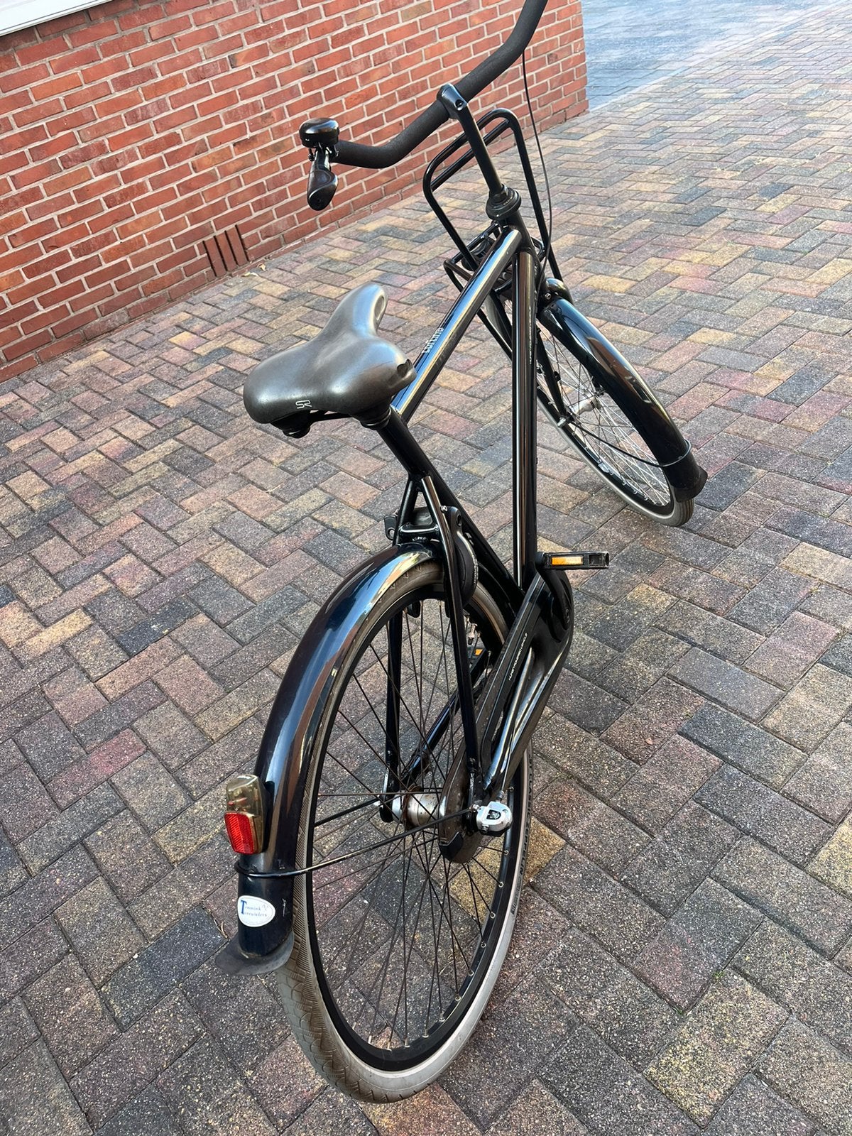 Te koop een nette fiets , zwart drie versnellingen, Terugtraprem, Gebruikt, Versnellingen, 65 cm of meer